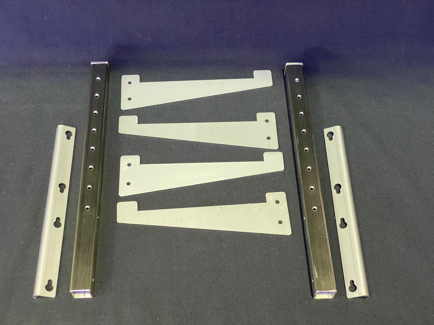 Components of the chef's workstation - mounting brackets, risers, and workstation brackets